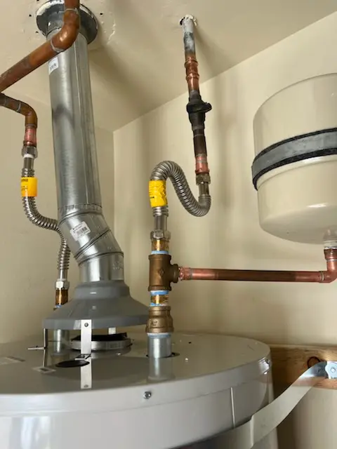 Water heater installation and plumbing repair in West Wauregan